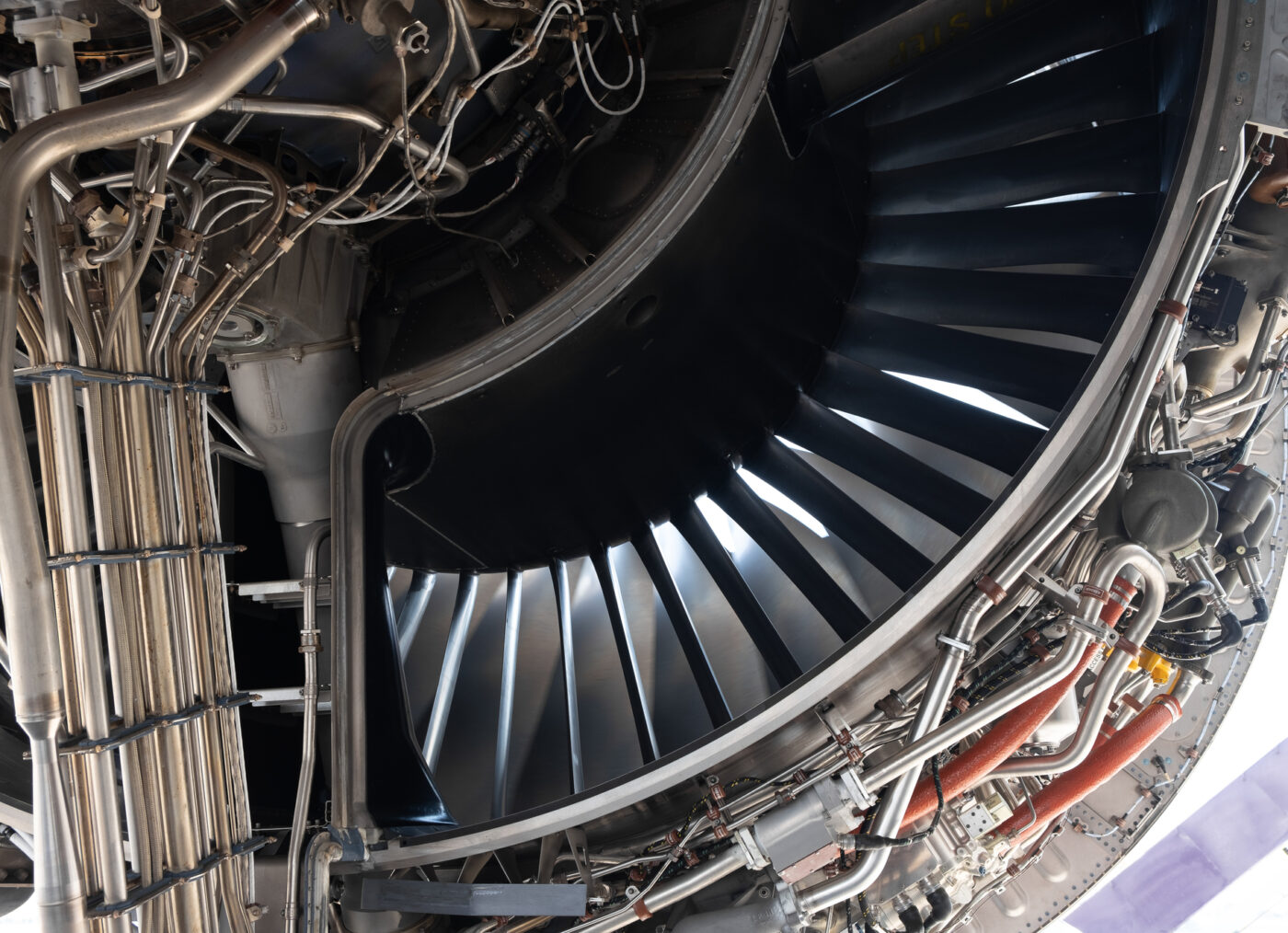 Gas turbine engine power plant repair by airplane technician.